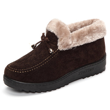 Bowknot glisser sur la fausse fourrure doublure semelle bout rond bottes courtes douces et chaudes